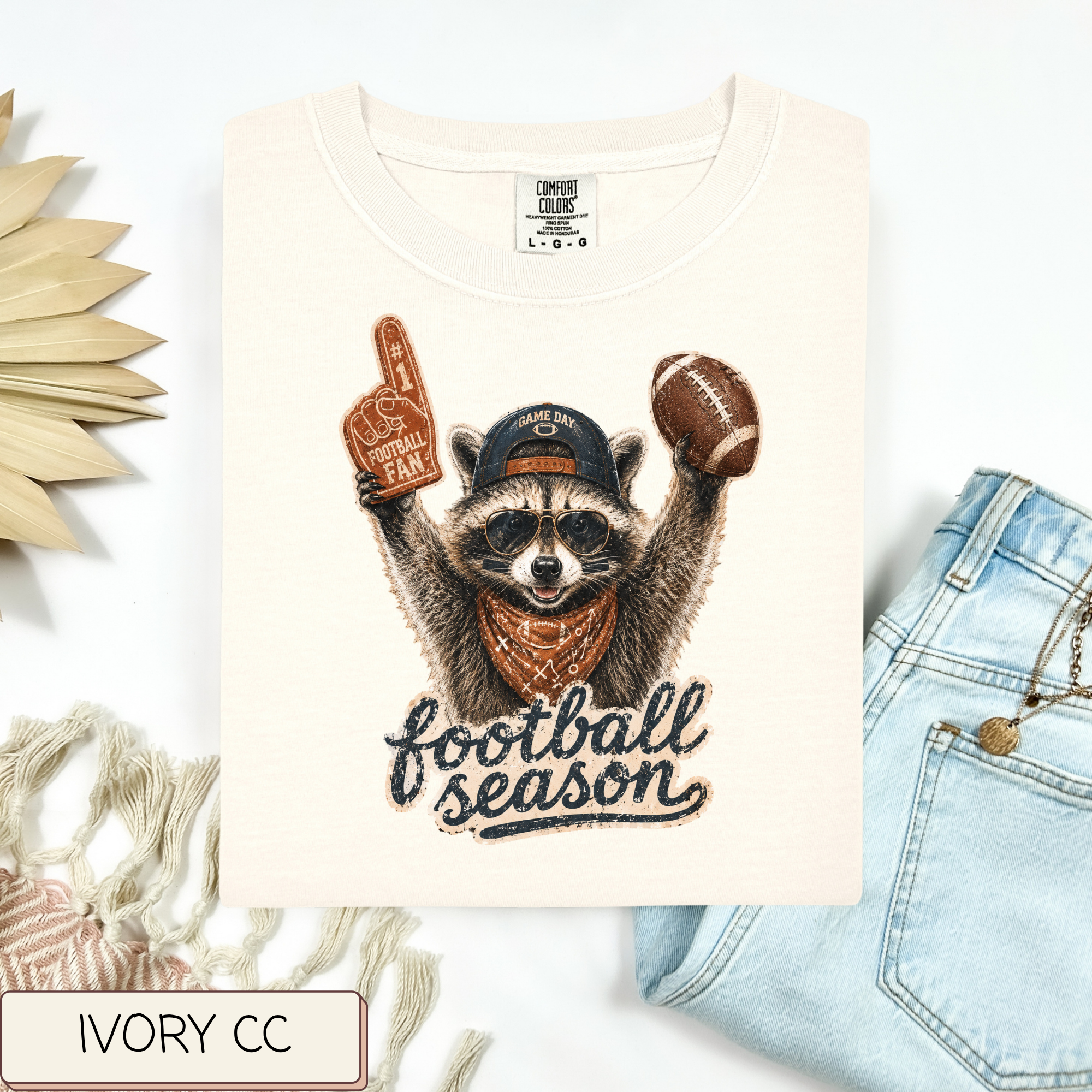 Football Season Raccoon Tee.